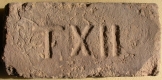 T XII 